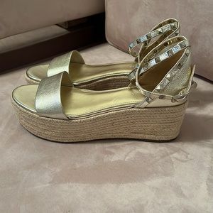 Marc Fisher gold platform, studded strapping, sandals.